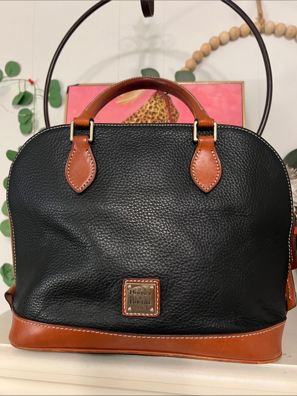 Dooney & Bourke Black and Brown Pebbled Leather Satchel with crossbody strap